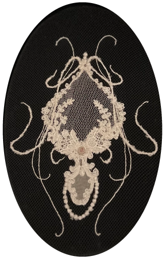 Black embroidered on the natural color of silk